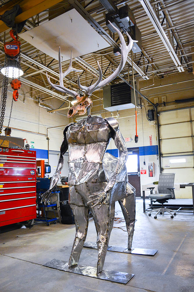 Raquel Martinez's sculpture of an elk centaur stands tall inside the welding shop at The University of New Mexico-Gallup on Wednesday, Aug. 7, 2024.