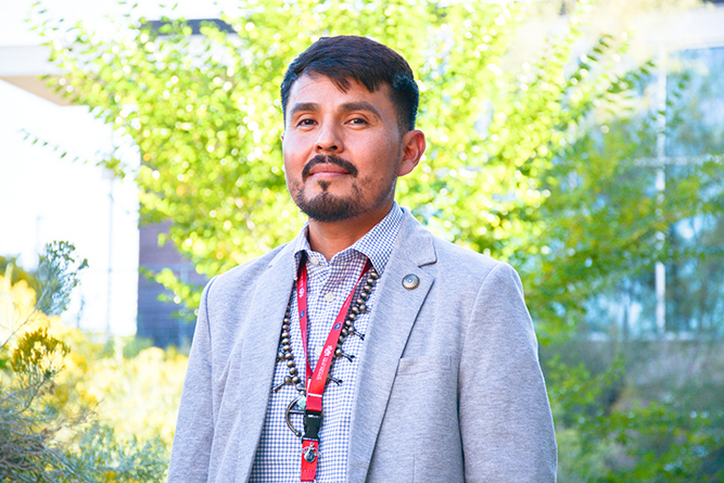 UNM-Gallup graduate Kevin Capitan, 39, of Tohatchi, poses for a portrait near the Student Services & Technology Center at the Gallup branch campus on Sept. 23, 2024.