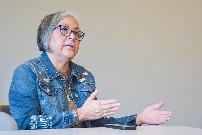 Sandra Freeland, education coordinator for the George Galanis Multicultural Center, gives feedback after a student presentation during the Professional and Technical Communication class at The University of New Mexico-Gallup on May 6, 2025.