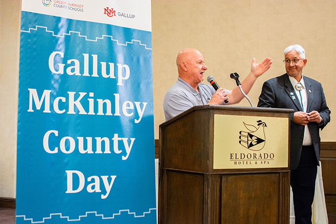 Former McKinley County Commissioner Bill Lee welcomes guests to the Gallup-McKinley County Day gala while current Commissioner Robert Baca looks on at Eldorado Hotel and Spa in Santa Fe on Thursday, Feb. 5, 2026.