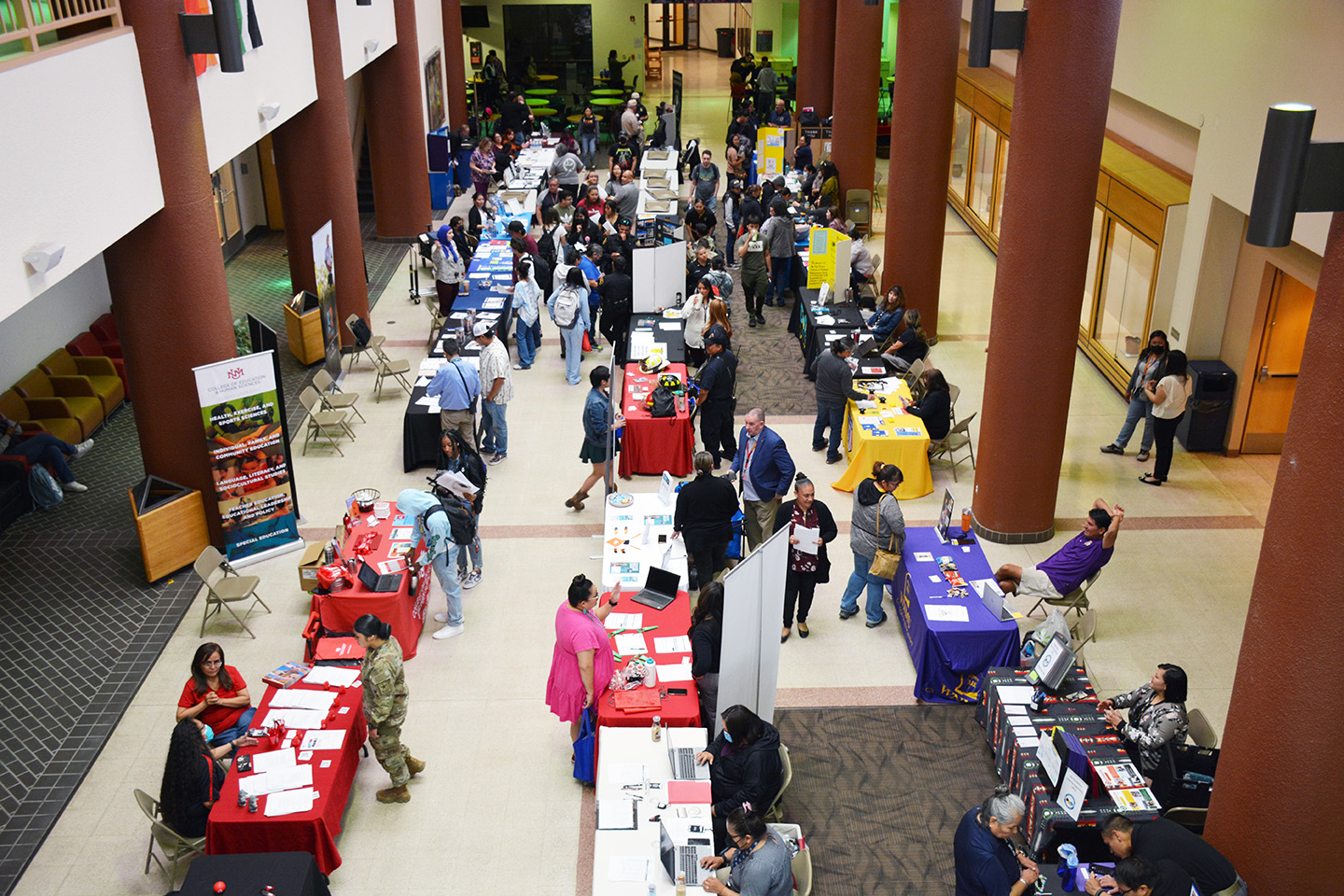 Students attend booths at College Transfer and Scholarship Fair