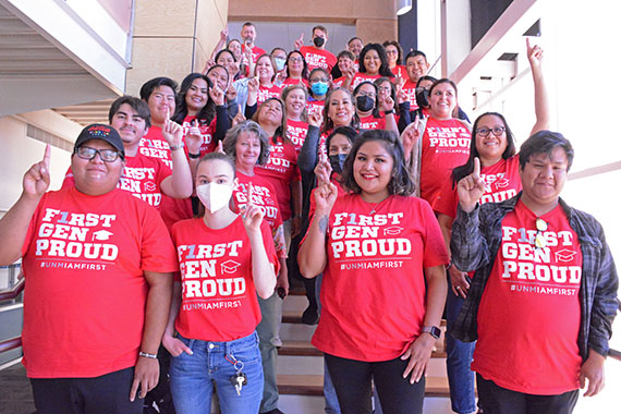 Nursing student Tiffany Armijo, second from left in the front row, poses for a photo with other first-generation college students, faculty and staff on the steps inside the Student Services and Technology Center on The University of New Mexico-Gallup campus in celebration of First-Generation College Celebration Day on Nov. 8.  
